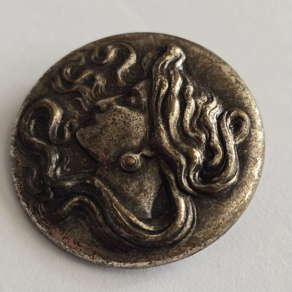Art Nouveau style brooch woman with flowing hair dark silver tone pin